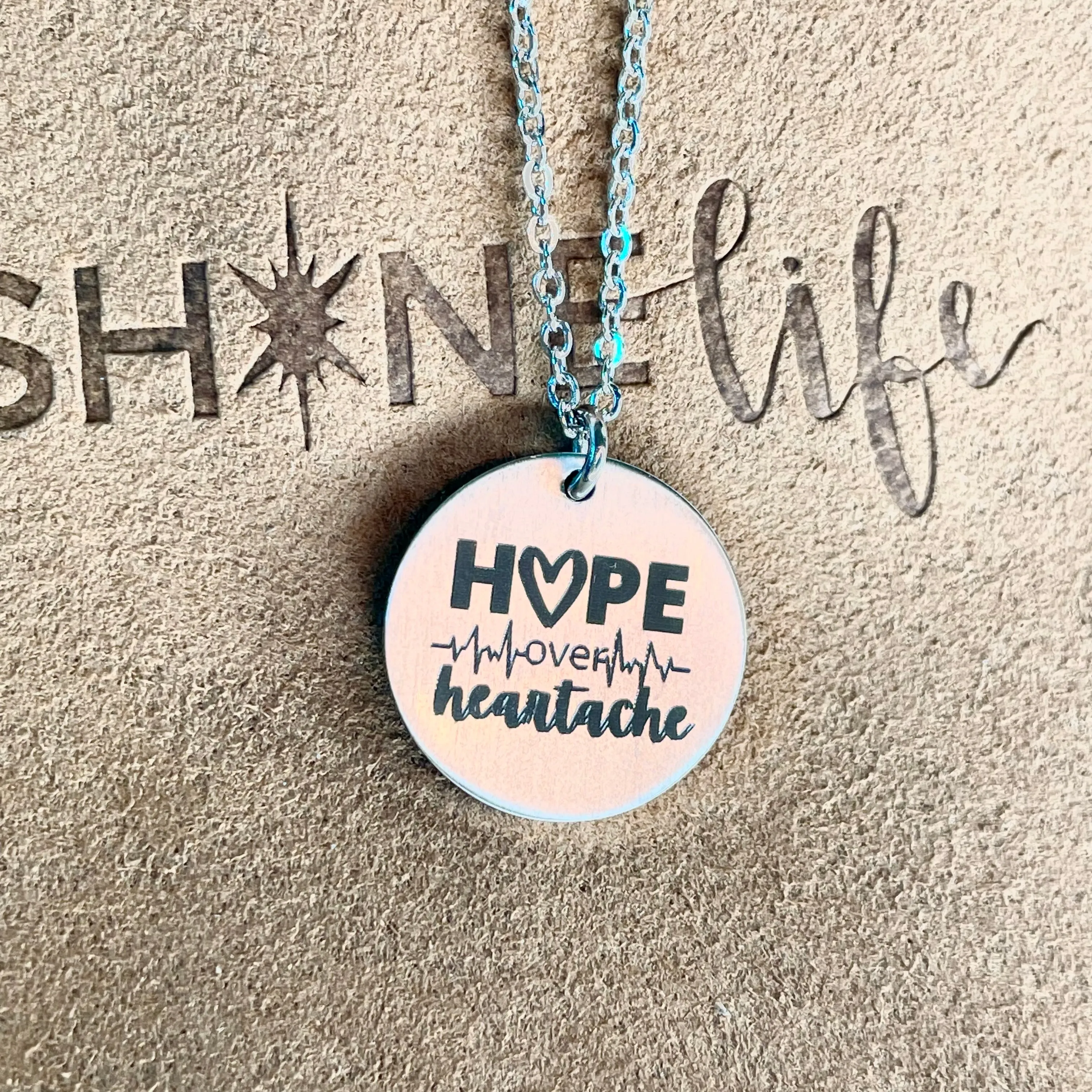 hope over heartache necklace